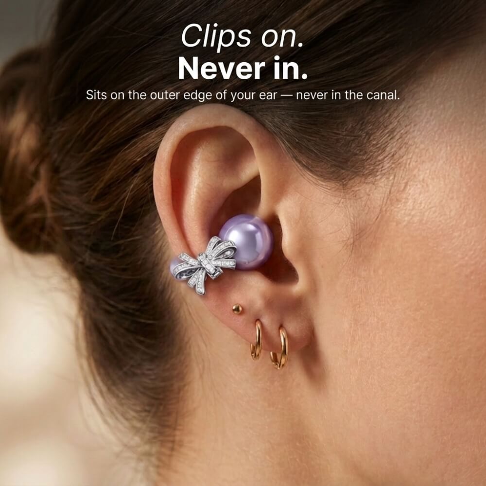 Clip-on earbuds sitting on the outer edge of the ear